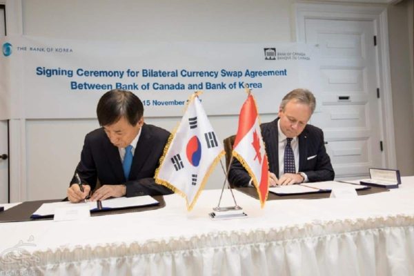 South Korea agrees to first-ever unlimited currency swap with Canada کره جنوبی و کانادا پیمان ملی منعقد کردند